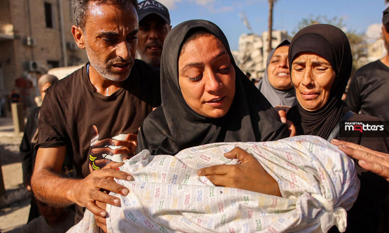 Mom crying with child