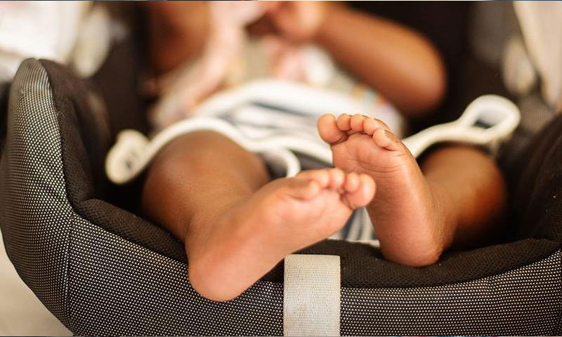 Woman smuggled baby